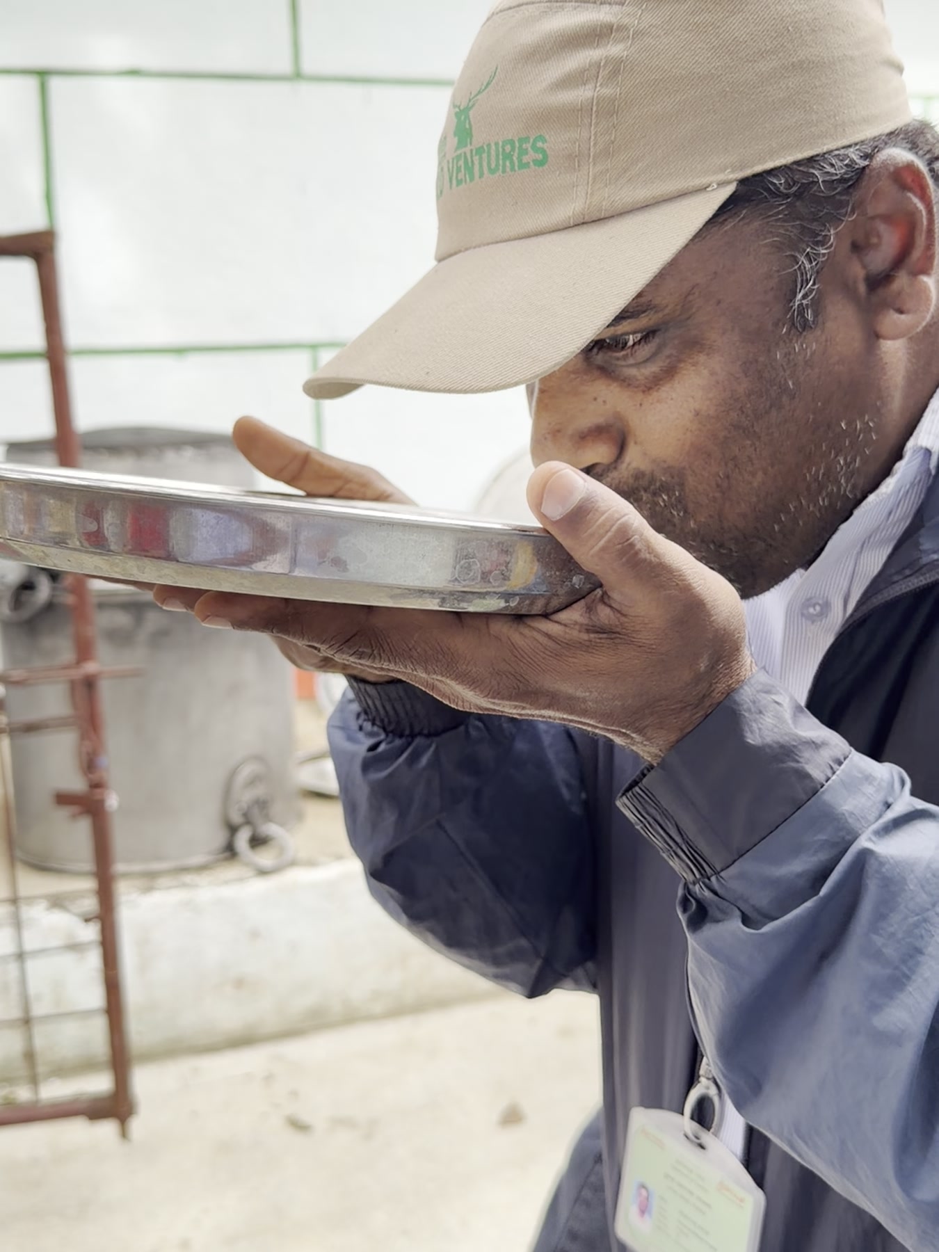 Our guide drinking fresh buttermilk directly from the plate
