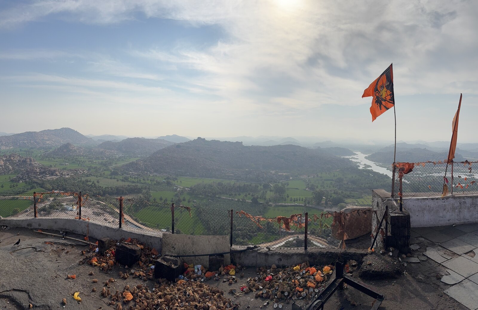 The flag and panoramic landscape from the summit